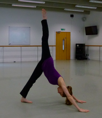 Three legged dog (yoga). London, 11/05/2013